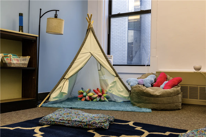 A teepee in the Woodland Hills calming space.